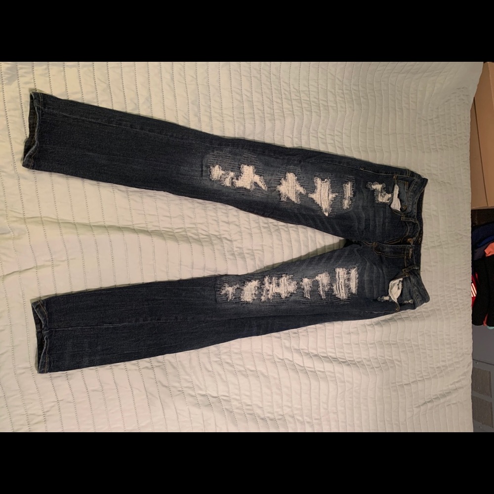Blue jeans with rips